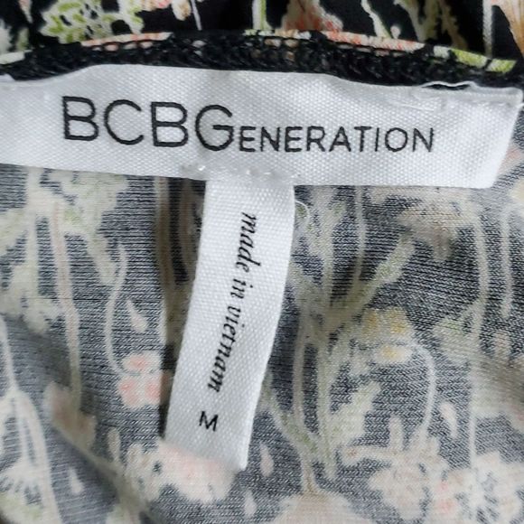 Adorable BCBG knit romper. So comfortable.Delicate pattern. Sheer ruffle… - Picture 7 of 7